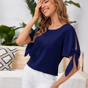 Camisa unicolor de puño con nudo