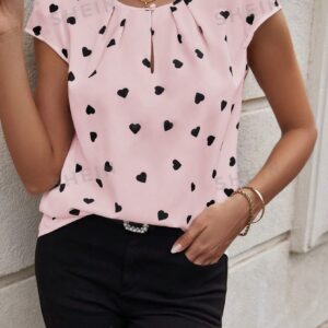 Clasi Camiseta casual de manga corta con cuello redondo para mujer con estampado de corazón, de verano